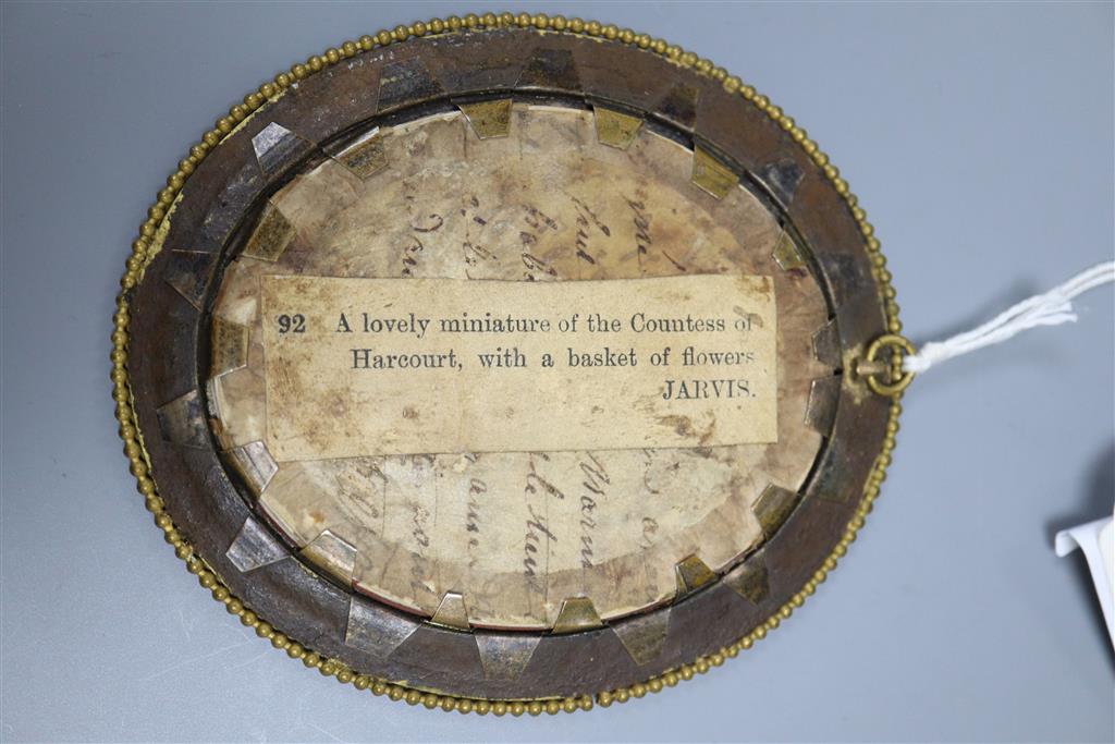 A 19th century oval portrait miniature of a lady on ivory, ormolu frame